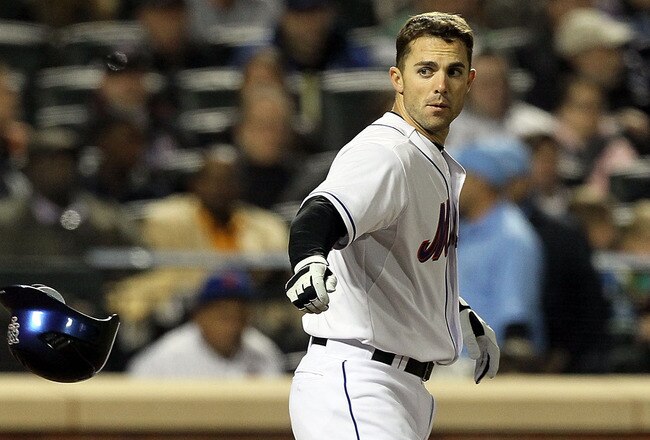NEW YORK - APRIL 19:  David Wright #5 of the New York Mets throws his helmet after striking out to end the fifth inning against the Chicago Cubs with the bases loaded on April 19, 2010 at Citi Field in the Flushing neighborhood of the Queens borough of New York City. Players from both teams are wearing #42 in honor of former player Jackie Robinson.  (Photo by Jim McIsaac/Getty Images)