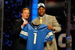NEW YORK - APRIL 22:  Ndamukong Suh of the Nebraska Cornhuskers stands with NFL Commissioner Roger Goodell as he holds up a Detroit Lions Jersey after Suh was picked #2 overall by the Lions during the 2010 NFL Draft at Radio City Music Hall on April 22, 2010 in New York City.  (Photo by Jeff Zelevansky/Getty Images)