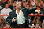 LAS VEGAS - AUGUST 24:  World Wrestling Entertainment Inc. Chairman Vince McMahon appears in the ring during the WWE Monday Night Raw show at the Thomas & Mack Center August 24, 2009 in Las Vegas, Nevada.  (Photo by Ethan Miller/Getty Images)