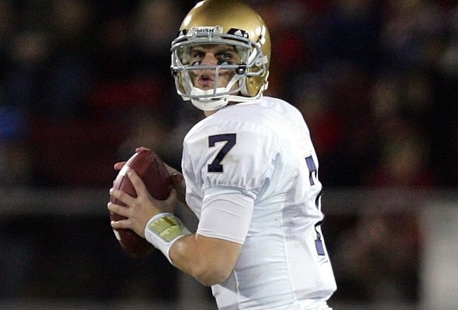 PALO ALTO, CA - NOVEMBER 28:  Jimmy Clausen #7 of the Notre Dame Fighting Irish in action during their game against the Stanford Cardinal at Stanford Stadium on November 28, 2009 in Palo Alto, California.  (Photo by Ezra Shaw/Getty Images)