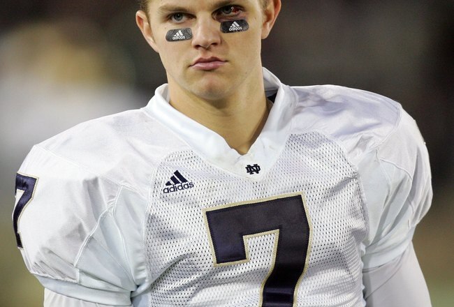 PALO ALTO, CA - NOVEMBER 28:  Jimmy Clausen #7 of the Notre Dame Fighting Irish walks the sideline during their game against the Stanford Cardinal at Stanford Stadium on November 28, 2009 in Palo Alto, California.  (Photo by Ezra Shaw/Getty Images)