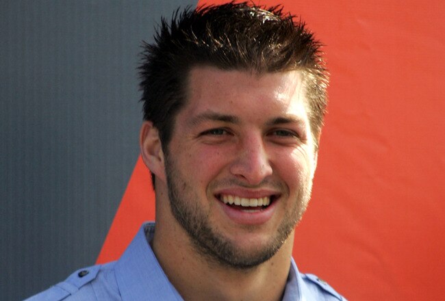 DAYTONA BEACH, FL - FEBRUARY 11:  Quaterback Tim Tebow #7 of the Florida Gators stands onstage before the first NASCAR Sprint Cup Series Gatorade Duel at Daytona International Speedway on February 11, 2010 in Daytona Beach, Florida.  (Photo by Jerry Markland/Getty Images for NASCAR)