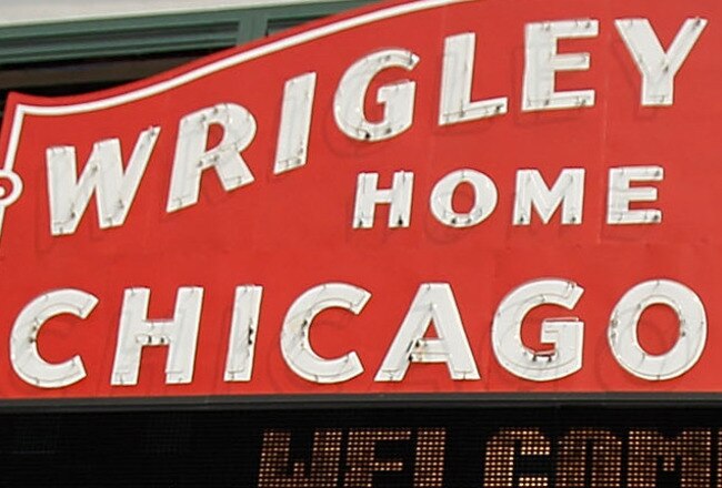 CHICAGO - APRIL 12: A fan dressed as the outfield ivy wall walks in front of Wrigley Field before the Opening Day game between the Chicago Cubs and the Milwaukee Brewers on April 12, 2010 in Chicago, Illinois. (Photo by Jonathan Daniel/Getty Images)