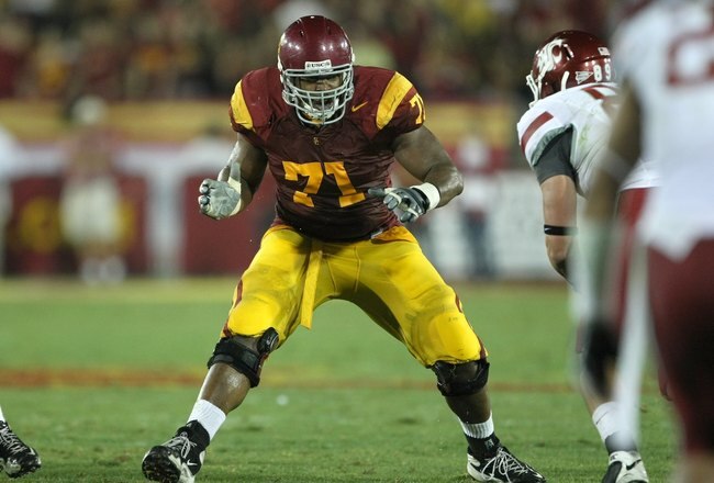 LOS ANGELES - SEPTEMBER 23:  Offensive tackle Charles Brown #71 of the USC Trojans blocks against the Washington State Cougars on September 23, 2009 at the Los Angeles Coliseum in Los Angeles, California.  USC won 27-6.   (Photo by Stephen Dunn/Getty Images)