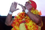 PERTH, AUSTRALIA - NOVEMBER 24:  Hulk Hogan enters the stage prior to his bout against Rick Flair during the Hulkamania Tour at the Burswood Dome on November 24, 2009 in Perth, Australia.  (Photo by Paul Kane/Getty Images)