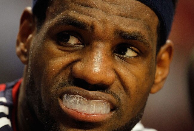 CHICAGO - APRIL 22: LeBron James #23 of the Cleveland Cavaliers sits on the bench and watches his teammates take on the Chicago Bulls in Game Three of the Eastern Conference Quarterfinals during the 2010 NBA Playoffs at the United Center on April 22, 2010 in Chicago, Illinois. NOTE TO USER: User expressly acknowledges and agrees that, by downloading and/or using this Photograph, User is consenting to the terms and conditions of the Getty Images License Agreement. (Photo by Jonathan Daniel/Getty Images)