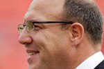 KANSAS CITY, MO - SEPTEMBER 20:  General Manager Scott Pioli of the Kansas City Chiefs walks the sidelines prior to the start of the game against the Kansas City Chiefs at Arrowhead Stadium on September 20, 2009 in Kansas City, Missouri.  (Photo by Jamie Squire/Getty Images)