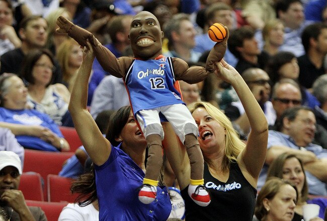 ORLANDO, FL - APRIL 21:  Fans hold up a giant Dwight Howard puppet as the Charlotte Bobcats take on the Orlando Magic in Game Two of the Eastern Conference Quarterfinals during the 2010 NBA Playoffs at Amway Arena on April 21, 2010 in Orlando, Florida. The Magic defeated the Bobcats 92-77. NOTE TO USER: User expressly acknowledges and agrees that, by downloading and/or using this Photograph, user is consenting to the terms and conditions of the Getty Images License Agreement.  (Photo by Doug Benc/Getty Images)