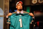 NEW YORK - APRIL 22:  Jared Odrick from Penn State holds up a Miami Dolphins jersey after the Dolphins selected Odrick number 28 overall during the first round of the 2010 NFL Draft at Radio City Music Hall on April 22, 2010 in New York City.  (Photo by Jeff Zelevansky/Getty Images)