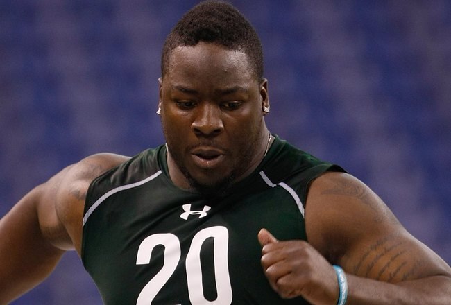 INDIANAPOLIS, IN - MARCH 1: Defensive lineman Lamarr Houston of Texas runs the 40 yard dash during the NFL Scouting Combine presented by Under Armour at Lucas Oil Stadium on March 1, 2010 in Indianapolis, Indiana. (Photo by Scott Boehm/Getty Images)