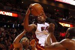 MIAMI - APRIL 23:  Forward Paul Pierce #34 of the Boston Celtics defends guard Dwyane Wade #3 of the Miami Heat in Game Three of the Eastern Conference Quarterfinals during the 2010 NBA Playoffs at American Airlines Arena on April 23, 2010 in Miami, Florida. NOTE TO USER: User expressly acknowledges and agrees that, by downloading and/or using this Photograph, User is consenting to the terms and conditions of the Getty Images License Agreement.  (Photo by Marc Serota/Getty Images)