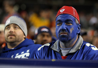 DENVER - NOVEMBER 26:  Giants fans were looking blue as the Denver Broncos defeated the New York Giants during NFL action at Invesco Field at Mile High on November 26, 2009 in Denver, Colorado. The Broncos defeated the Giants 26-6.  (Photo by Doug Pensinger/Getty Images)