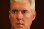 GREEN BAY, WI - MARCH 06: General manager Ted Thompson of the Green Bay Packers listens as quarterback Brett Favre announces his retirement at a press conference on March 6, 2008 at Lambeau Field in Green Bay, Wisconsin. (Photo by Jonathan Daniel/Getty Images)