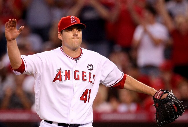 ANAHEIM, CA - OCTOBER 22:  John Lackey #41 of the Los Angeles Angels of Anaheim reacts after striking out Robinson Cano #24 (Not Shown) of the New York Yankees ending the forth inning in Game Five of the ALCS during the 2009 MLB Playoffs at Angel Stadium on October 22, 2009 in Anaheim, California.  (Photo by Stephen Dunn/Getty Images)
