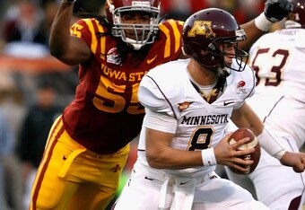 TEMPE, AZ - DECEMBER 31:  Quarterback Adam Weber #8 of
the Minnesota Golden Gophers is sacked by Christopher Lyle #55 of the
Iowa State Cyclones during the second quarter of the Insight Bowl at
Arizona Stadium on December 31, 2009 in Tempe, Arizona.  (Photo by
Christian Petersen/Getty Images)