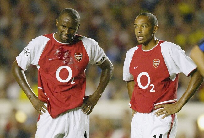 LONDON - SEPTEMBER 17:  Patrick Vieira and Thierry Henry of Arsenal look dejected during the UEFA Champions League First Stage Group B match between Arsenal and Inter Milan at Highbury on September 17, 2003 in London. (Photo by Ross Kinnaird/Getty Images)