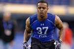 INDIANAPOLIS, IN - MARCH 2: Defensive back David Pender of Purdue runs the 40 yard dash during the NFL Scouting Combine presented by Under Armour at Lucas Oil Stadium on March 2, 2010 in Indianapolis, Indiana. (Photo by Scott Boehm/Getty Images)
