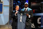 NEW YORK - APRIL 22:  Russell Okung from the Oklahoma State Cowboys poses with NFL Commissioner Roger Goodell (L) as they hold a Seattle Seahawks jersey after Okung was selected number 6 overall by the Seahawks in the first round during the 2010 NFL Draft at Radio City Music Hall on April 22, 2010 in New York City.  (Photo by Jeff Zelevansky/Getty Images)