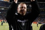 DENVER - DECEMBER 20:  Oakland Raiders head coach Tom Cable celebrates a victory over the Denver Broncos at Invesco Field at Mile High on December 20, 2009 in Denver, Colorado. The Raiders defeated the Broncos 20-19.  (Photo by Jeff Gross/Getty Images)