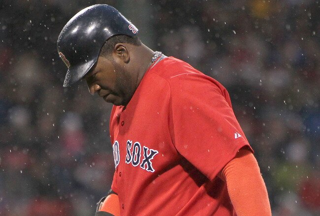 BOSTON - APRIL 17:  David Ortiz #34 of the Boston Red Sox reacts after grounding out against the Tampa Bay Rays at Fenway Park on April 17, 2010 in Boston, Massachusetts.  The contest  is a completion of the game that was suspended during the ninth inning on April 16, 2010 due to rain. (Photo by Jim Rogash/Getty Images)
