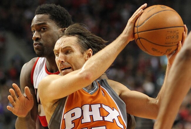 PORTLAND, OR - APRIL 24:  Steve Nash #13 of the Phoenix Suns drives against Martell Webster #23 of the Portland Trail Blazers during Game 4 of the Western Conference Quarterfinals of the NBA Playoffs on April 24, 2010 at the Rose Garden in Portland, Oregon. The Blazers defeated the Suns 96-97. NOTE TO USER: User expressly acknowledges and agrees that, by downloading and or using this Photograph, user is consenting to the terms and conditions of the Getty Images License Agreement. (Photo by Otto Greule Jr/Getty Images)
