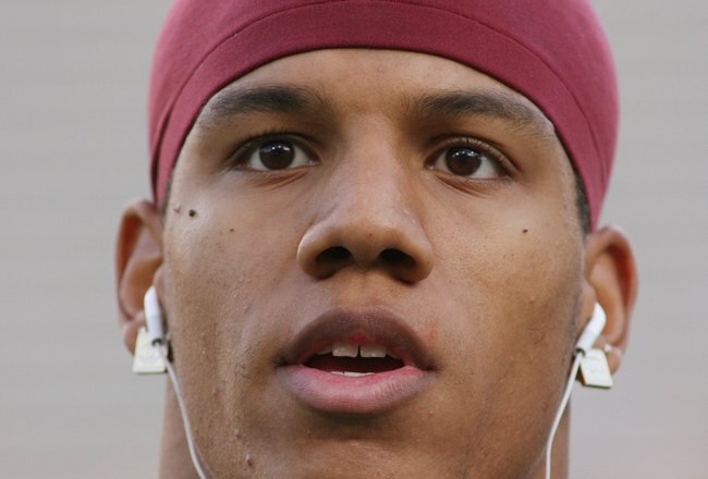 TEMPE, AZ - NOVEMBER 7:  Taylor Mays #2 of the USC Trojans listens to music as he looks in the stands before the game against the Arizona State Sun Devils on November 7, 2009 at Sun Devil Stadium in Tempe, Arizona.  USC won 14-9.  (Photo by Jeff Golden/Getty Images)