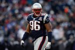 FOXBORO, MA - JANUARY 10:  Adalius Thomas #96 of the New England Patriots looks on against the Baltimore Ravens during the 2010 AFC wild-card playoff game at Gillette Stadium on January 10, 2010 in Foxboro, Massachusetts. The Ravens won 33-14. (Photo by Elsa/Getty Images)