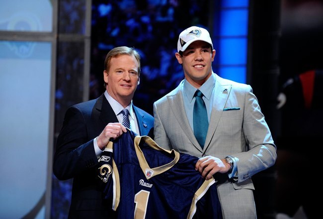 NEW YORK - APRIL 22:  Quarterback Sam Bradford (R) from the Oklahoma Sooners poses with NFL Commissioner Roger Goodell as they hold up a St. Louis Rams jersey after the Rams selected Bradford numer 1 overall during the first round of the 2010 NFL Draft at Radio City Music Hall on April 22, 2010 in New York City.  (Photo by Jeff Zelevansky/Getty Images)