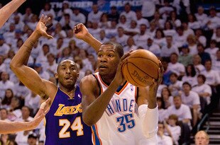 OKLAHOMA CITY - APRIL 24: Kevin Durant #35 of the Oklahoma City Thunder drives to the basket against Kobe Bryant #24 of the Los Angeles Lakers during Game Four of the Western Conference Quarterfinals of the 2010 NBA Playoffs on April 24, 2010 at the Ford Center in Oklahoma City, Oklahoma. NOTE TO USER: User expressly acknowledges and agrees that, by downloading and or using this photograph, User is consenting to the terms and conditions of the Getty Images License Agreement. (Photo by Dilip Vishwanat/Getty Images)