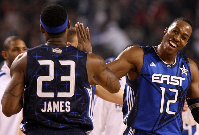 ARLINGTON, TX - FEBRUARY 14:  Dwight Howard #12 and LeBron James #23 of the Eastern Conference celebrate their 141-139 vicotry over the Western Conference during the NBA All-Star Game, part of 2010 NBA All-Star Weekend at Cowboys Stadium on February 14, 2010 in Arlington, Texas. NOTE TO USER: User expressly acknowledges and agrees that, by downloading and or using this photograph, User is consenting to the terms and conditions of the Getty Images License Agreement.  (Photo by Jed Jacobsohn/Getty Images)