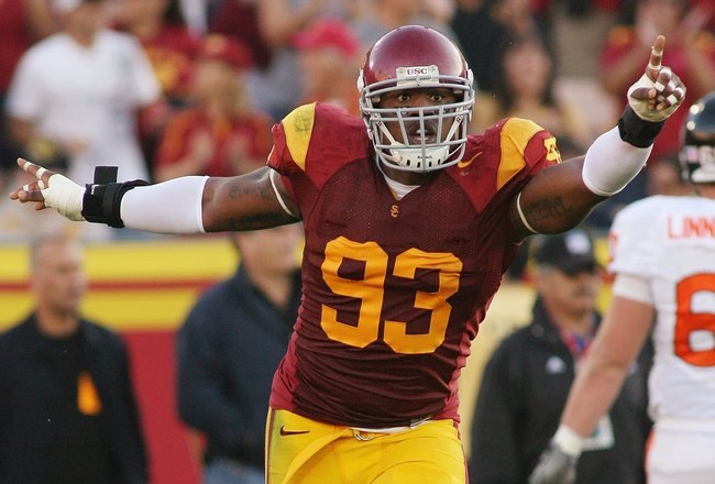LOS ANGELES, CA - OCTOBER 24:  Everson Griffen #93 of the USC Trojans celebrates a fumble recovery against the Oregon State Beavers on October 24, 2009 at the Los Angeles Coliseum in Los Angeles, California.  USC won 42-36.  (Photo by Jeff Golden/Getty Images)