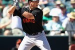 PHOENIX - MARCH 17:  Buster Posey #28 of the San Francisco Giants at bat during the MLB spring training game against the Oakland Athletics at Phoenix Municipal Stadium on March 17, 2010 in Phoenix, Arizona. The Giants defeated the A's 6-1.  (Photo by Christian Petersen/Getty Images)