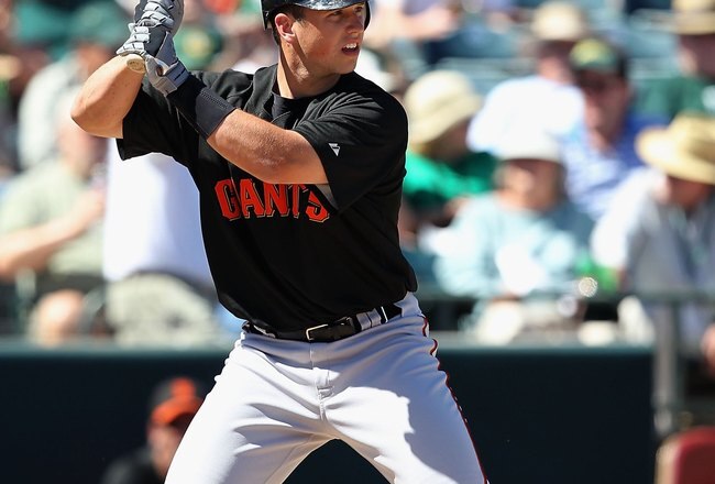 PHOENIX - MARCH 17:  Buster Posey #28 of the San Francisco Giants at bat during the MLB spring training game against the Oakland Athletics at Phoenix Municipal Stadium on March 17, 2010 in Phoenix, Arizona. The Giants defeated the A's 6-1.  (Photo by Christian Petersen/Getty Images)