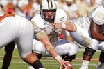 AUSTIN, TX - NOVEMBER 07:  Center Ian Bustillo #73 of the UCF Knights prepares to snap the ball against the Texas Longhorns on November 7, 2009 at Darrell K Royal - Texas Memorial Stadium in Austin, Texas.  Texas won 35-3.  (Photo by Brian Bahr/Getty Images)