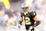 NEW ORLEANS - JANUARY 24:  Darren Sharper #42 of the New Orleans Saints runs on the field during player introductions against the Minnesota Vikings during the NFC Championship Game at the Louisana Superdome on January 24, 2010 in New Orleans, Louisiana.  (Photo by Chris Graythen/Getty Images)