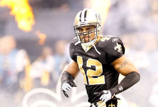 NEW ORLEANS - JANUARY 24:  Darren Sharper #42 of the New Orleans Saints runs on the field during player introductions against the Minnesota Vikings during the NFC Championship Game at the Louisana Superdome on January 24, 2010 in New Orleans, Louisiana.  (Photo by Chris Graythen/Getty Images)