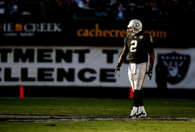 OAKLAND, CA - JANUARY 03:  JaMarcus Russell #2 of the Oakland Raiders looks on against the Baltimore Ravens during an NFL game at Oakland-Alameda County Coliseum on January 3, 2010 in Oakland, California.  (Photo by Jed Jacobsohn/Getty Images)