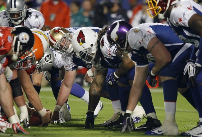 MIAMI GARDENS, FL - JANUARY 31:  Justin Smith #94 of the NFC lines up at the line of scrimmage during the 2010 AFC-NFC Pro Bowl game at Sun Life Stadium on January 31, 2010 in Miami Gardens, Florida. The AFC defeated the NFC 41-34. (Photo by Scott Halleran/Getty Images)