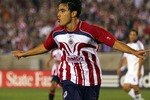 LOS ANGELES, CA - JULY 28:  Omar Bravo #9 of CD Chivas de Guadalajara celebrates scoring a goal  in the second half against the Los Angeles Galaxy during their SuperLiga match at the Los Angeles Memorial Coliseum on July 28, 2007 in Los Angeles, California. Chivas de Guadalajara defeated the Galaxy 2-1. (Photo by Robert Laberge/Getty Images)