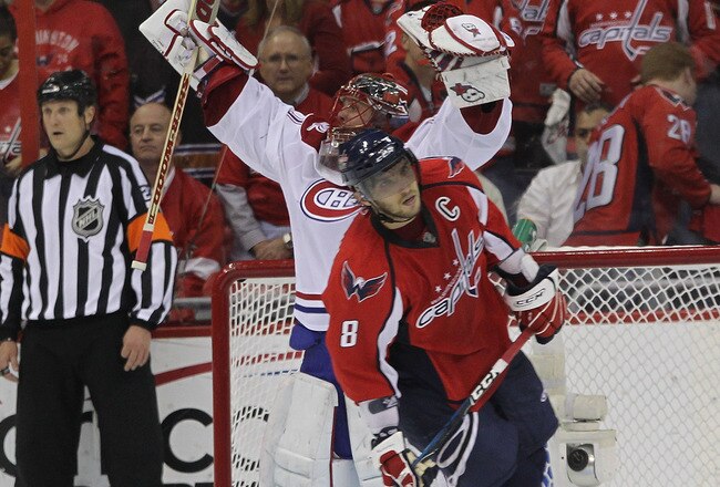 WASHINGTON - APRIL 28: Jaroslav Halak #41 of the Montreal Canadiens celebrates as Alex Ovechkin #8 of the Washington Capitals skates away following the Canadiens 2-1 win in Game Seven of the Eastern Conference Quarterfinals during the 2010 NHL Stanley Cup Playoffs at the Verizon Center on April 28, 2010 in Washington, DC. (Photo by Bruce Bennett/Getty Images)