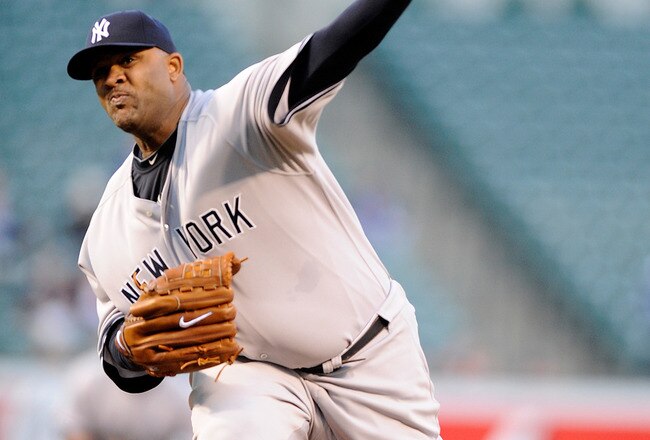 BALTIMORE - APRIL 28:  CC Sabathia #52 of the New York Yankees pitches against the Baltimore Orioles at Camden Yards on April 28, 2010 in Baltimore, Maryland.  (Photo by Greg Fiume/Getty Images)
