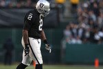 OAKLAND, CA - JANUARY 03:  JaMarcus Russell #2 of the Oakland Raiders walks off the field against the Baltimore Ravens during an NFL game at Oakland-Alameda County Coliseum on January 3, 2010 in Oakland, California.  (Photo by Jed Jacobsohn/Getty Images)