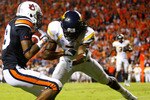 AUBURN, AL - SEPTEMBER 19:  Darvin Adams #89 of the Auburn Tigers scores a touchdown as he gets tackled by Robert Sands #2 of the West Virginia Mountaineers at Jordan-Hare Stadium on September 19, 2009 in Auburn, Alabama.  (Photo by Kevin C. Cox/Getty Images)