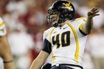 GLENDALE, AZ - JANUARY 02:  Kicker Pat McAfee of the West Virginia Mountaineers kicks a field goal against the Oklahoma Sooners at the Tostito's Fiesta Bowl at University of Phoenix Stadium January 2, 2008 in Glendale, Arizona.  (Photo by Stephen Dunn/Getty Images)