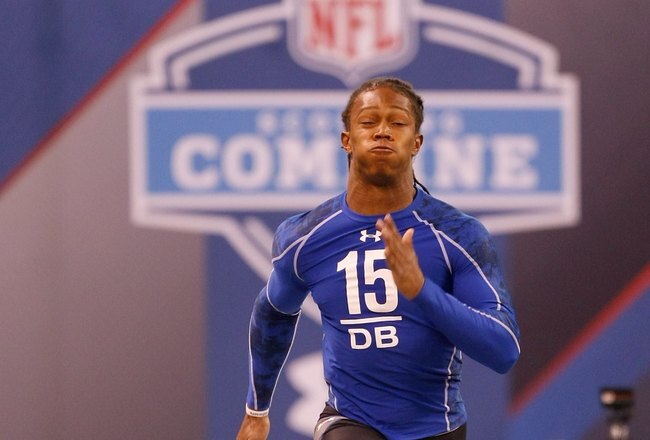 INDIANAPOLIS, IN - MARCH 2: Defensive back Chris Cook of Virginia runs the 40 yard dash during the NFL Scouting Combine presented by Under Armour at Lucas Oil Stadium on March 2, 2010 in Indianapolis, Indiana. (Photo by Scott Boehm/Getty Images)