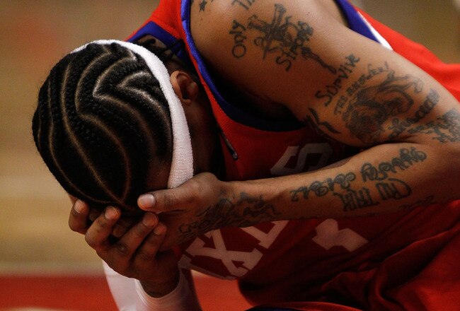 CHICAGO - FEBRUARY 20: Allen Iverson #3 of the Philadelphia 76ers holds his head after being hit in the face during a game against the Chicago Bulls at the United Center on February 20, 2010 in Chicago, Illinois. NOTE TO USER: User expressly acknowledges and agrees that, by downloading and/or using this Photograph, User is consenting to the terms and conditions of the Getty Images License Agreement. (Photo by Jonathan Daniel/Getty Images)