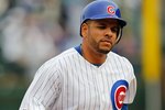 CHICAGO - APRIL 12:  Aramis Ramirez #16 of the Chicago Cubs runs the bases after his fourth inning home run against the Milwaukee Brewers on Opening Day at Wrigley Field on April 12, 2010 in Chicago, Illinois. The Cubs defeated the Brewers 9-5. (Photo by Jonathan Daniel/Getty Images)