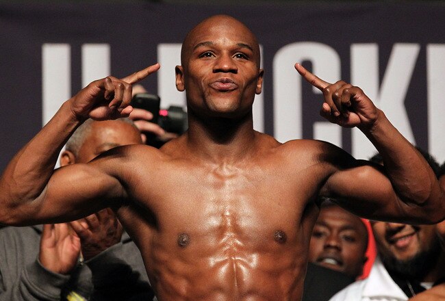 LAS VEGAS - APRIL 30:  Boxer Floyd Mayweather Jr. steps on the scale to weigh 146 pounds during the weigh-in for his bout against Shane Mosley at the MGM Grand Garden Arena on April 30, 2010 in Las Vegas, Nevada. Mayweather and Mosley will meet in a 12-round welterweight bout on May 1, 2010 in Las Vegas. (Photo by Jed Jacobsohn/Getty Images)
