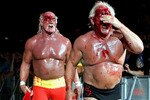 MELBOURNE, AUSTRALIA - NOVEMBER 21:  Hulk Hogan whips his opponent Ric Flair with his belt during Hulk Hogan's Hulkamania Tour at Rod Laver Arena on November 21, 2009 in Melbourne, Australia.  (Photo by Mark Dadswell/Getty Images)