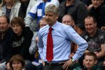 WIGAN, ENGLAND - APRIL 18:  Arsene Wenger the manager of Arsenal looks on during the Barclays Premier League match between Wigan Athletic and Arsenal at the DW Stadium on April 18, 2010 in Wigan, England.  (Photo by Alex Livesey/Getty Images)
